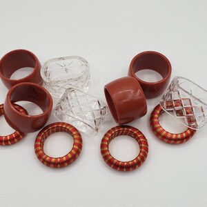 Napkin Rings Retro (11) Eclectic Acrylic Brick, Gold, Clear Hong Kong, Taiwan. This fun set includes 4 brick colored, 4 brick/gold, 3 clear