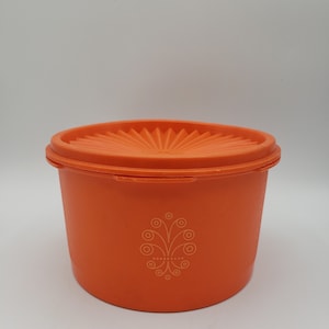Vintage Retro Orange Tupperware Container Servalier With Sunburst Lid #1298-16. This is the small canister in this series. Item 1298-16 with