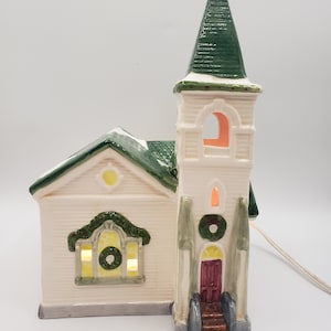Christmas Village Lighted Church Ceramic Holiday Display 1990's 9.5" Tall Works! Measures about 9.5" tall, 6.25" wide and 7" long. In the