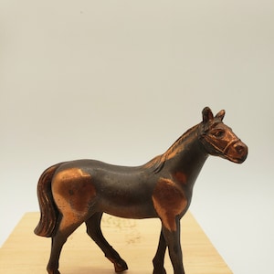 Solid Metal Horse Statue Figurine Decoration Vintage 4&quot; Small Western Equestrian. I am not sure what material he is made out of.