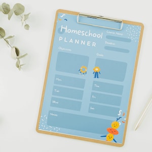 May include: A blue and brown clipboard with the text "Homeschool Planner" and a weekly schedule. The clipboard has a light blue background with colorful illustrations of cartoon characters.