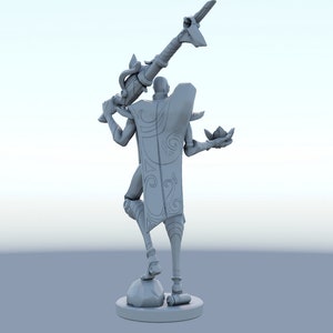 May include: A gray 3D-printed figurine of a character holding a staff and a lotus flower. The figure is standing on a round base. The character has a cape with a decorative design.