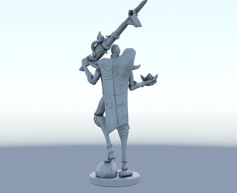 May include: A gray 3D-printed figurine of a character holding a staff and a lotus flower. The figure is standing on a round base. The character has a cape with a decorative design.