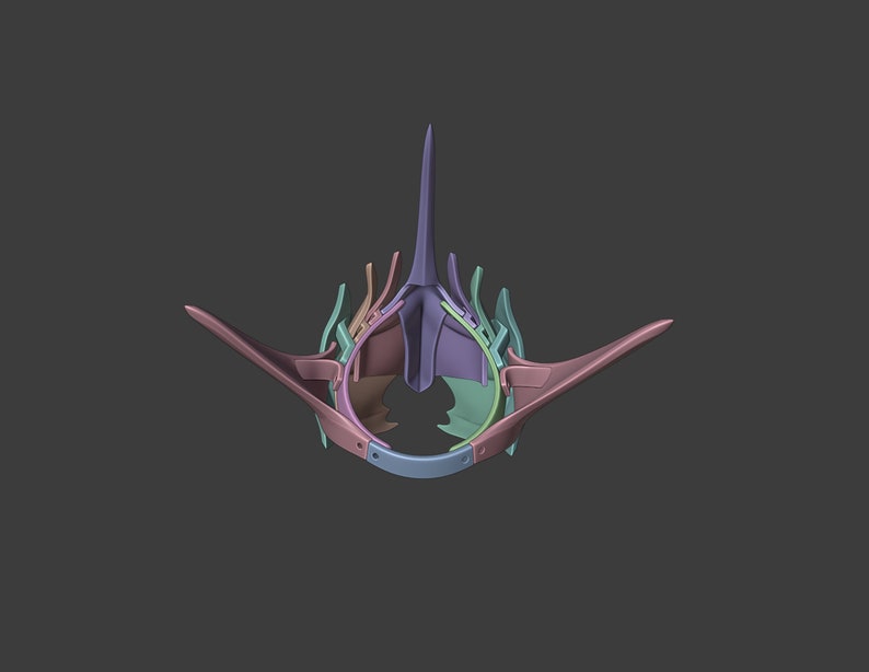 Puede incluir: Una corona impresa en 3D con una parte superior puntiaguda y m&uacute;ltiples capas. La corona est&aacute; hecha de pl&aacute;stico morado, verde y marr&oacute;n.