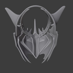 Puede incluir: Una m&aacute;scara gris impresa en 3D con un dise&ntilde;o afilado y angular. La m&aacute;scara tiene un c&iacute;rculo grande abierto en el centro y una forma triangular puntiaguda en la parte inferior.