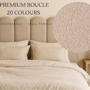 May include: Beige bouclé headboard with matching bedding and pillows. The image includes the text "PREMIUM BOUCLE 20 COLOURS" and "WANDPANEELE - WALL PANELS". A close-up shows the fabric texture.