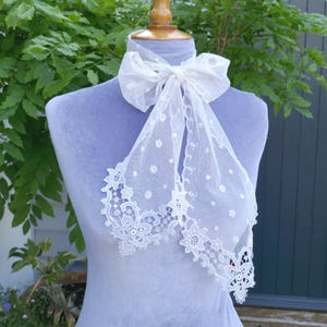 An Antique Machine Embroidered Lace Tie or Small Scarf with Muslin Appliqué to the Ends