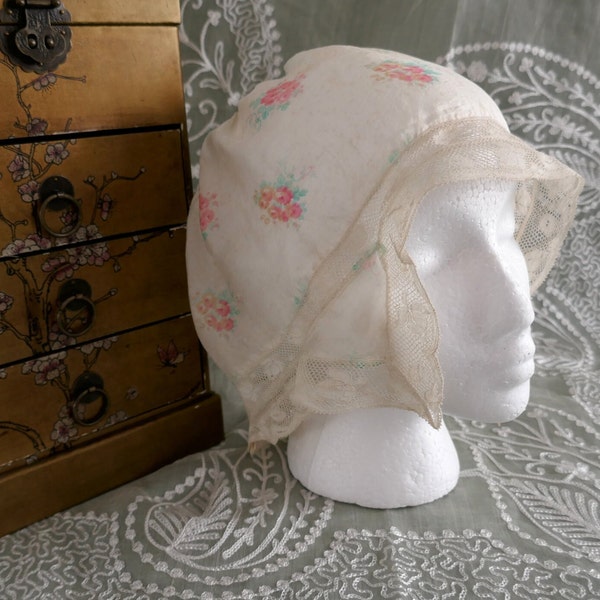 An Antique Edwardian Rose Patterned Silk Boudoir or Night Bonnet with Valenciennes Lace Trimming