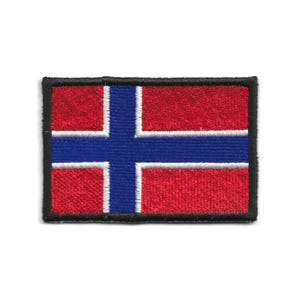 May include: Embroidered patch featuring the flag of Norway. The rectangular patch has a red background with a blue Nordic cross outlined in white. The patch is bordered with a black edge.