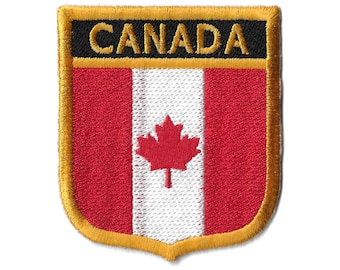 May include: A red and white Canadian flag patch with a gold border and the word "CANADA" in black lettering.