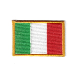 May include: Embroidered patch featuring the Italian flag. The rectangular patch displays vertical stripes of green, white, and red, with a gold border. The patch is likely for clothing or accessories.