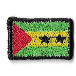 May include: An embroidered patch featuring the flag of São Tomé and Príncipe. The flag is green, yellow, and red with two black stars.