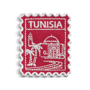 May include: A rectangular embroidered patch with a red background and white scalloped edges. The design features white stitching depicting a building with a dome, a minaret, and palm trees, with the word TUNISIA stitched in white at the top.