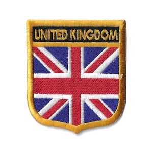 May include: A gold embroidered patch with the Union Jack flag and the text "UNITED KINGDOM" in black.