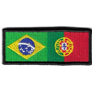 以下が含まれることがあります： ブラジルとポルトガルの国旗が刺繍されたパッチ。ブラジルの国旗は緑色で、黄色のひし形の中に青い円と白い星が描かれています。ポルトガルの国旗は緑色と赤色で、金色の紋章が描かれています。