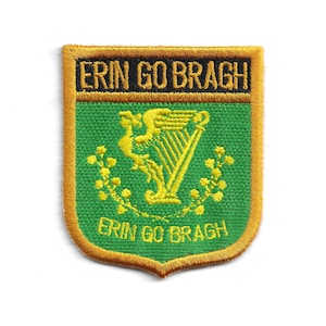 May include: Embroidered patch with a green background, gold trim, and the words "ERIN GO BRAGH" in gold. The patch features a gold harp and floral accents, symbolising Irish heritage.