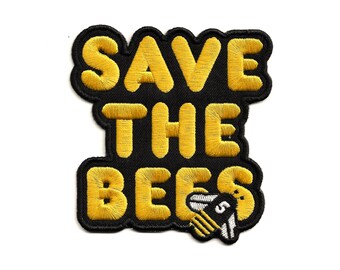 May include: Black and yellow embroidered patch with the text "Save the Bees" and a stylized bee illustration.