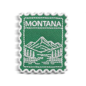 Peut inclure: Un écusson brodé vert avec une bordure festonnée blanche. L'écusson présente le mot "MONTANA" en haut et une scène de montagne et de forêt en dessous. Le motif est cousu avec du fil blanc.