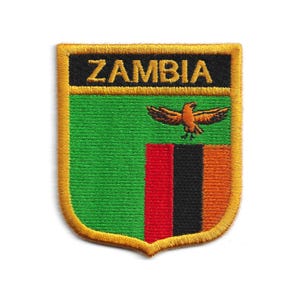 Zambias nationella sköld - Broderad flagga med guldkant, strykbar kant