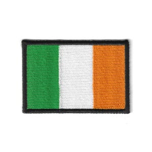 May include: Embroidered patch featuring the flag of Ireland. The rectangular patch has a green, white, and orange vertical tricolor design, with a black border. The patch is likely for clothing or accessories.