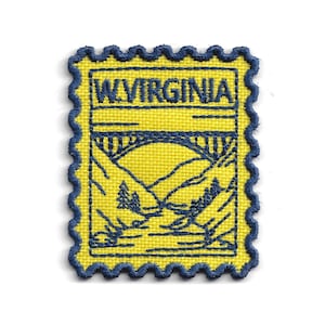 May include: A rectangular embroidered patch with a scalloped edge in dark blue and yellow. The design features a dark blue stitched landscape of a bridge over a valley with the text W.VIRGINIA at the top, all set against a bright yellow background.