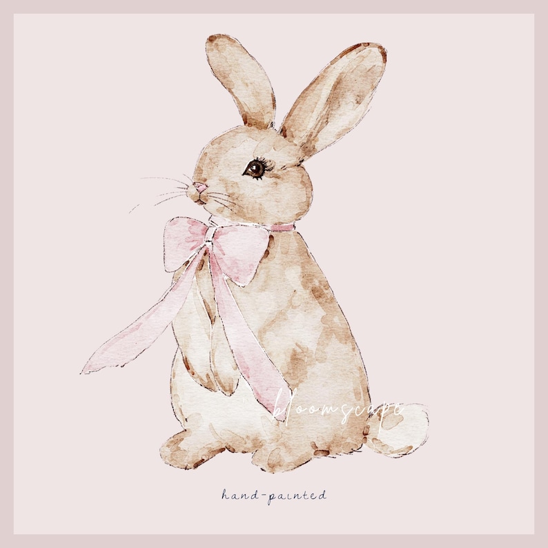 May include: A watercolor painting of a brown rabbit wearing a pink bow. The rabbit is sitting on a light pink background. The text "hand-painted" is written below the rabbit.