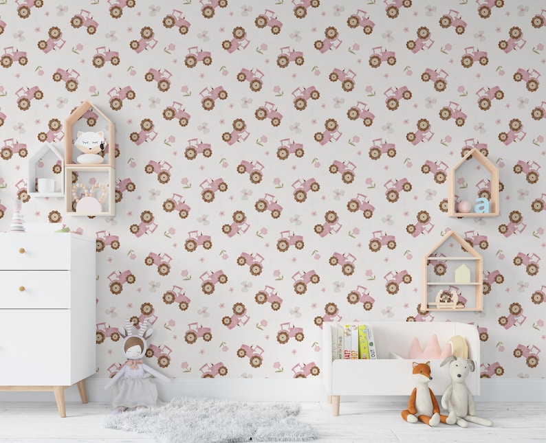 May include: A light-colored wallpaper featuring a repeating pattern of pink tractors and small brown flowers. The tractors have brown wheels and are set against a neutral background. The wallpaper is in a child's room.