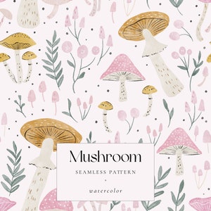 以下が含まれることがあります： 白い背景に、ピンクと黄色の水彩で描かれたキノコのイラストが、緑の葉と小さなピンクの花と共に、シームレスなパターンを形成しています。画像の下部には「Mushroom Seamless Pattern watercolor」というテキストがあります。