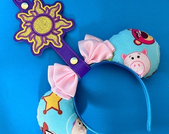 Rapunzel Corona Sun inspiriert - Einzelohrhalter, perfekt zum Anklipsen an Taschen und Parks. Disney Verhöhnt Themen