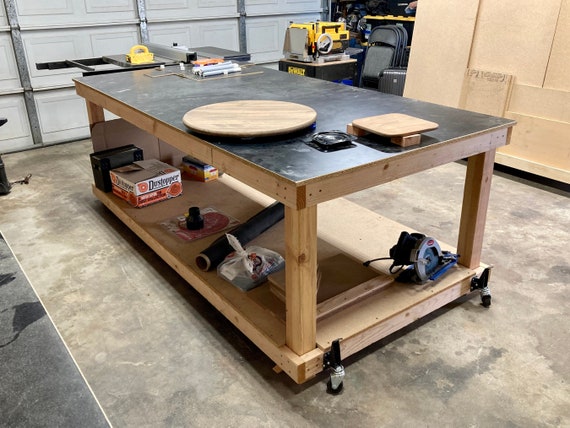 Simple Workbench. One 4x8 sheet of 3/4 Plywood and about 10 2x4s