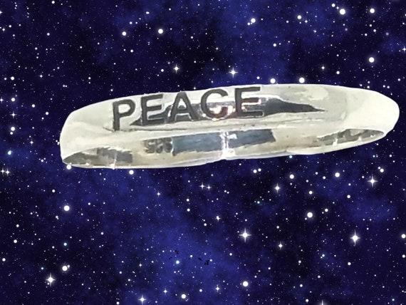 Sterling Silver Band 3 mm Ring with the Word PEACE etched in.
