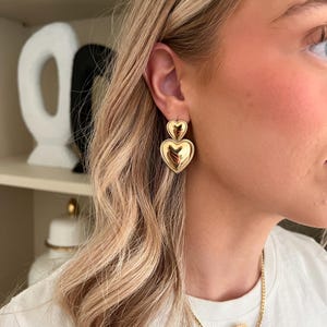 Boucles d&#39;oreilles double coeur