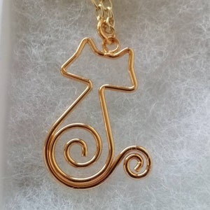 Gold cat pendant