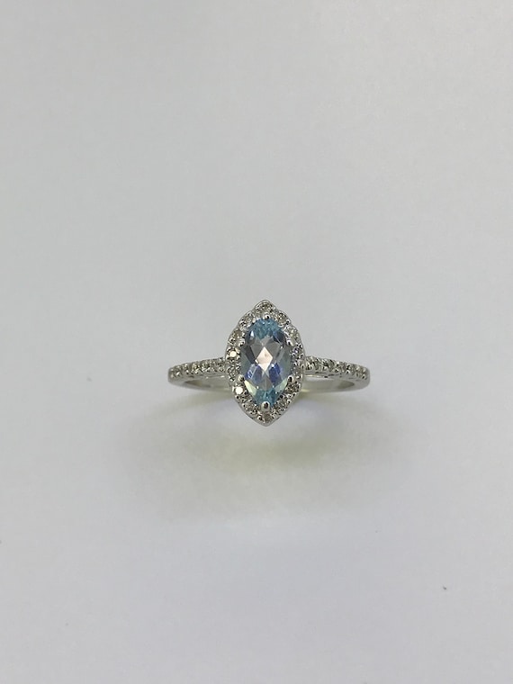 Marquise-cut Aquamarine and Diamond Halo Ring