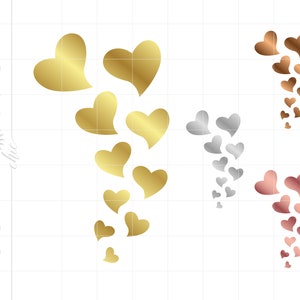 May include: Three sets of gold, silver, and rose gold heart shapes arranged in a cascading pattern, resembling a flower.