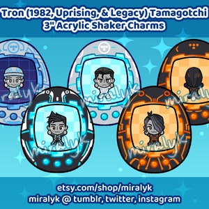 May include: Four 3-inch acrylic shaker charms featuring characters from the Tron franchise. The charms are shaped like Tamagotchi devices and feature characters from the Tron films, including Tron, Quorra, and Clu. The charms are blue, black, and orange.