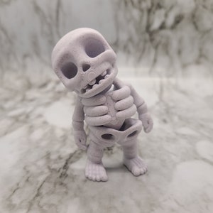 Flexi Fidget Skeli / Juguete Fidget