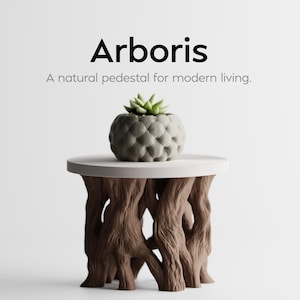May include: A round white tabletop supported by a brown base resembling tree roots. A grey tufted planter containing a green succulent sits on top. The text Arboris and A natural pedestal for modern living are displayed above the object.