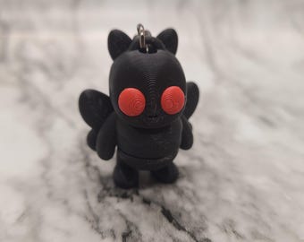 Llavero de bebé polilla