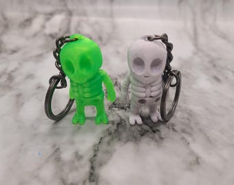 Llavero de esqueleto alienígena