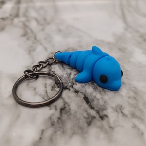 Nyckelring för babydelfiner