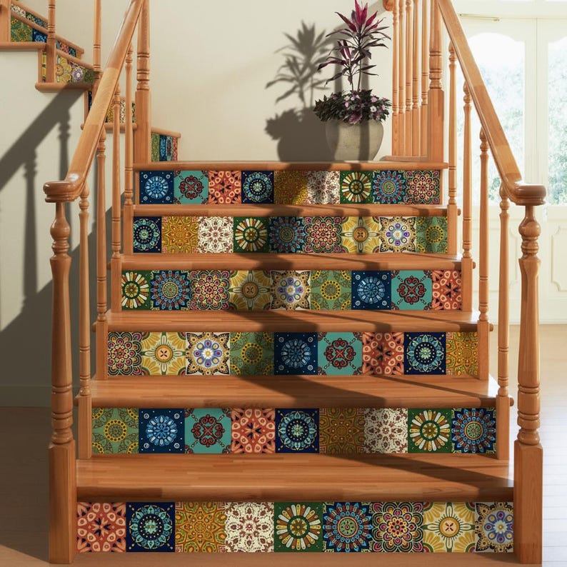 May include: A wooden staircase featuring decorative tile stickers on each riser. The tiles display a variety of intricate, colorful geometric and floral patterns in shades of blue, orange, green, and yellow, creating a vibrant visual display.