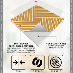 May include: A close-up of a tile sticker with a wood-grain pattern. The sticker is laminated for durability and protection. The text on the image reads "Protective layer to improve strength, durability and preservation of the tile stickers, Lamination, A layer of resistance, Eco friendly, Green Guard Certified, State-of-the-art Epson-certified, Eco solvent printed using Avery Dennison premium quality vinyl, Your ceramic tile or any other flat smooth surface, Thin, Flexible, Durable, Note: Tile sticker thickness for matte/glossy finish-300-350 microns and anti-skid (antislip) finish 400-450 microns. The final printed product closely resembles our listing photos and mock-ups, with minimal color variation (upto 15%) due to digital and printing discrepancies."