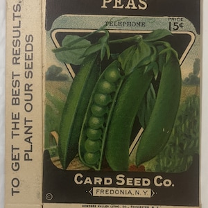 May include: Vintage seed packet for peas with a green pea pod illustration. The packet is brown and black with white text that reads "PEAS TELEPHONE PRICE 15¢ CARD SEED CO. FREDONIA, N.Y. GENESEE VALLEY LITHO. CO., ROCHESTER, N. Y. 449".