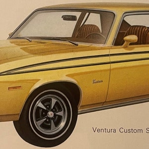 May include: Illustration of a yellow 1974 Pontiac Ventura Custom Sprint. The car features black racing stripes and the word "Sprint" on the side. The car is yellow with black wheels and a brown interior.