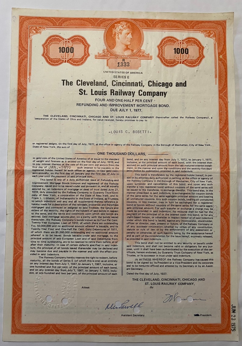 May include: A vintage bond certificate from The Cleveland, Cincinnati, Chicago and St. Louis Railway Company, dated July 1, 1927, for the amount of $1,000. The certificate is printed on a red and white paper with a portrait of a man in the upper left corner.