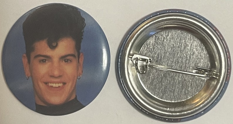 Vintage NKOTB Jordan Knight smiling pinback button shown front and back view