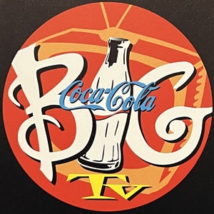 May include: A red circle with a white outline and the word "BIG" in white with a blue Coca-Cola logo and a bottle of Coca-Cola in the center. The word "TV" is in yellow at the bottom.