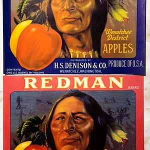 May include: Vintage Redman brand apple crate label featuring a Native American man with a red apple and a yellow apple in front of him. The label reads "Wenatchee District Apples" and "H.S. Denison & Co. Produce of U.S.A."