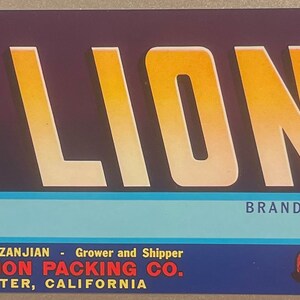 May include: A vintage label for Red Lion brand produce, featuring a roaring red lion illustration and the text "RED LION BRAND", "NET WEIGHT 27 LBS", "PRODUCE OF U.S.A.", "JOHN C. KAZANJIAN Grower and Shipper", "RED LION PACKING CO.", and "EXETER, CALIFORNIA".